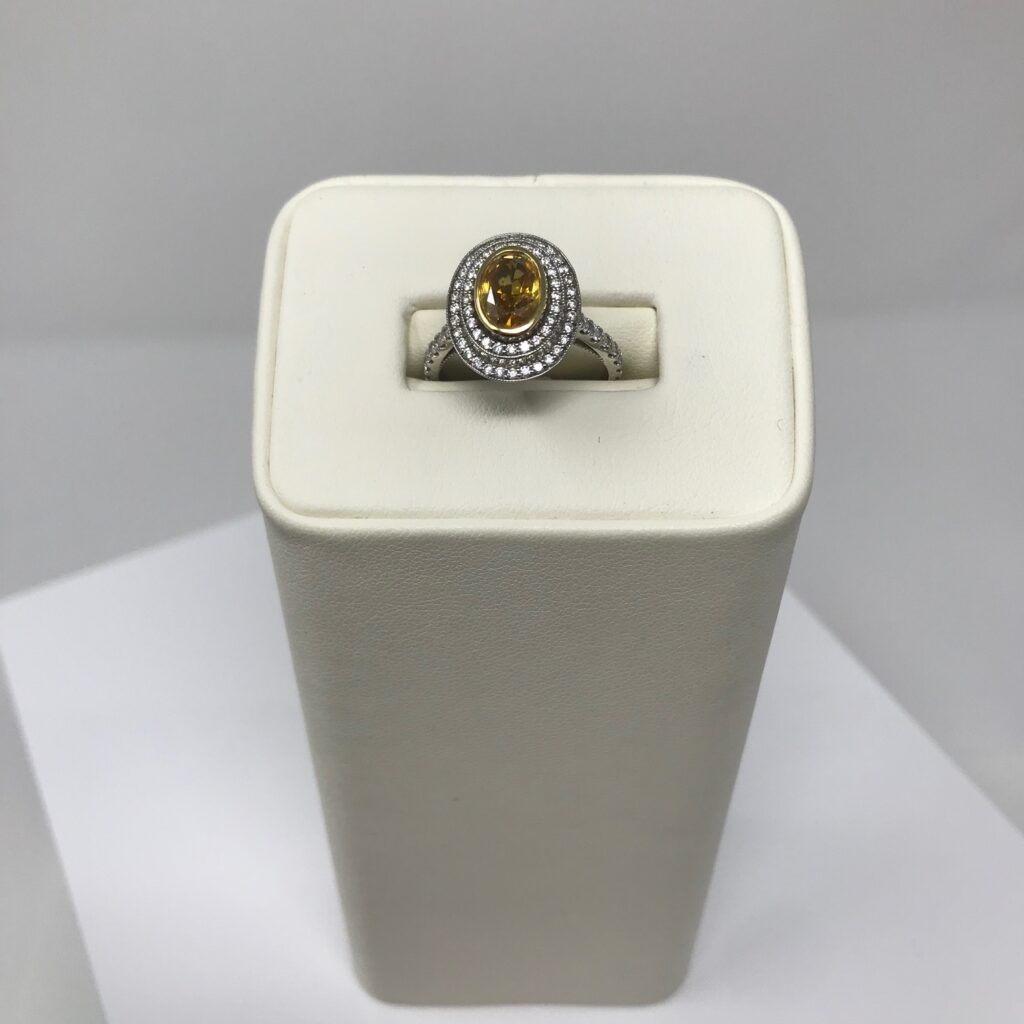 40% OFF! Was $21,800 - Now $13,080! 1.1 total carat weight. SI2. Fancy Yellow colour. Very good cut. 19K white gold.